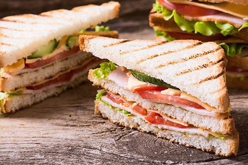 Delicious fresh sandwiches with turkey and tomatoes